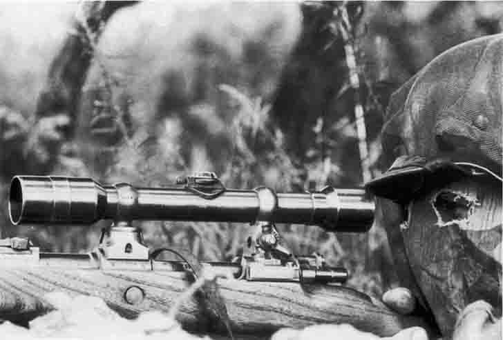 German sniper in camouflage mask