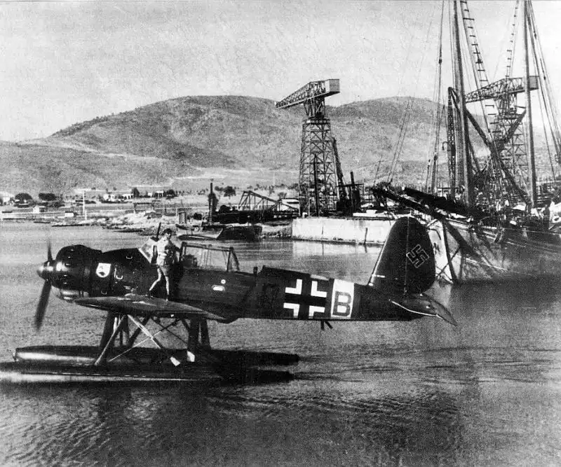 German Arado Ar 196A-2 floatplane of Maritime Reconnaissance Group 125 parked inside a port facility on Crete during maritime patrol operations in the Mediterranean, 1943.