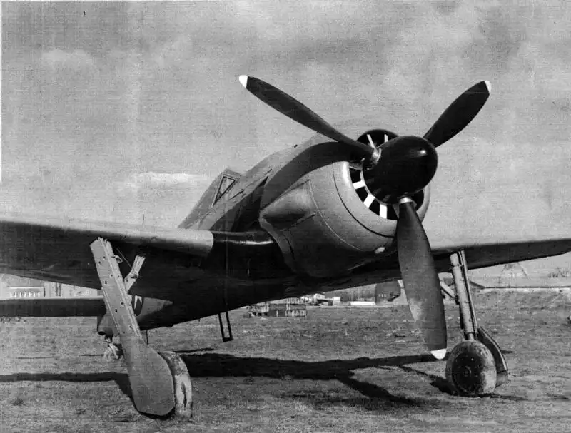 Captured German Focke-Wulf Fw 190A-8 fighter aircraft at Saint-Trond airfield in Belgium after Operation Bodenplatte in 1945