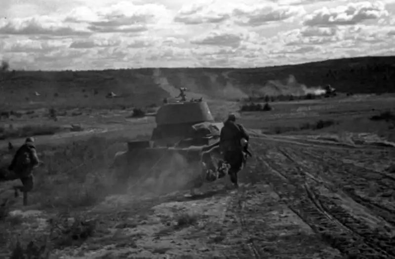 Red Army infantry with Mosin–Nagant rifles and T-26 light tanks attacking German positions during the summer of 1941