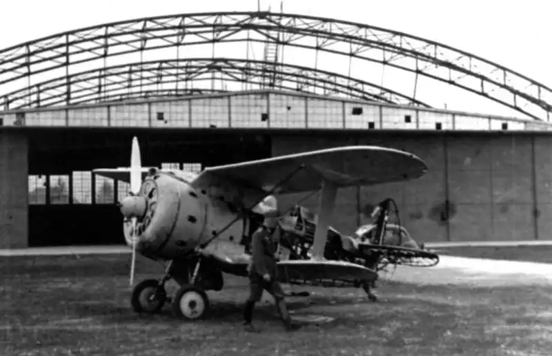 Damaged Soviet I-153 Chaika biplane fighter on a captured airfield during Operation Barbarossa, summer 1941