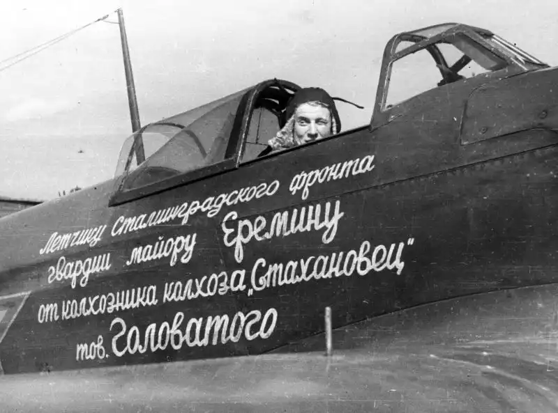Soviet fighter pilot Boris Yeremin in the cockpit of a Yak-1B fighter donated by a collective farmer, USSR, 1943