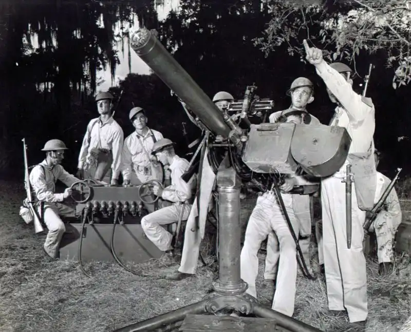 U.S. anti-aircraft crew operating a water-cooled .50 caliber Colt-Browning machine gun during training in the United States, 1942.