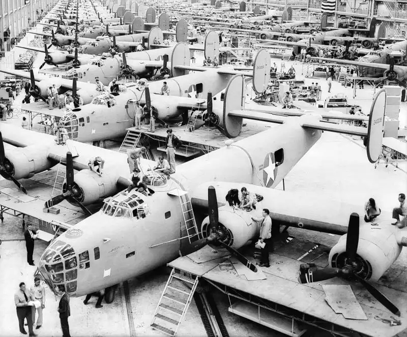 Industrial assembly line filled with Consolidated B-24 Liberator heavy bombers in an American aircraft factory, April 1943.