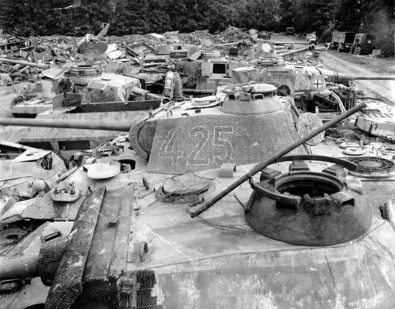 Captured German Panther and Panzer IV tanks in a collection point after the Falaise Pocket, France, 1944