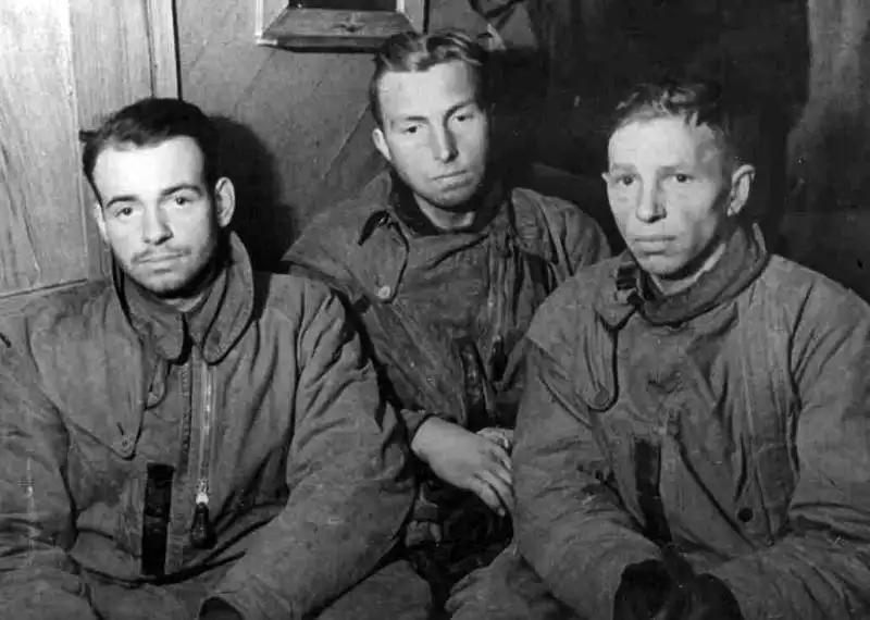 Captured Luftwaffe crew members of a Junkers Ju 88 bomber photographed by Soviet war correspondent Yevgeny Khaldei near Murmansk after their aircraft made an emergency landing in 1941.