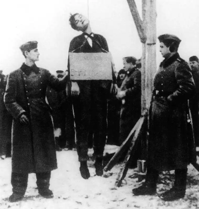 Captured Wehrmacht trophy photograph showing the execution of Soviet partisan Zoya Kosmodemyanskaya in Petrishchevo 1941.