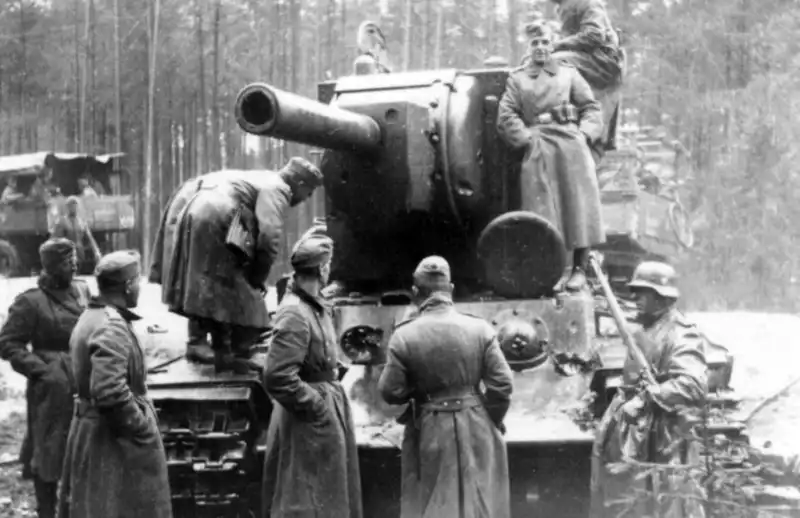 German soldiers inspecting an abandoned Soviet KV-2 heavy tank at Alakurtti, Karelo-Finnish SSR, July 1941.