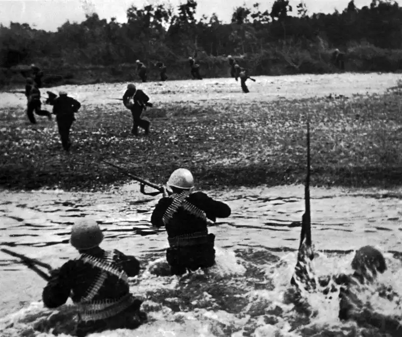 Soviet Naval Infantrymen of the 8th Brigade under Col. Gorpishchenko land on the shores of Crimea under heavy enemy fire