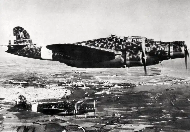 Italian CANT Z.1007 Alcione bombers flying over Greece on March 3, 1941, during a World War II bombing mission.