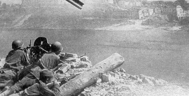 Soviet infantry firing a Maxim machine gun across the Western Dvina River during the liberation of Vitebsk in June 1944