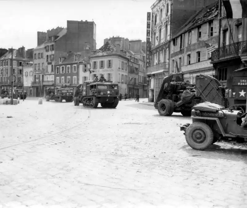 M4 High-Speed Tractors with 90mm M1A1 anti-aircraft guns in Cherbourg, France, during the Battle of Normandy