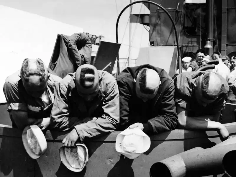 U.S. Coast Guard sailors with haircuts forming the word “HELL” during the Normandy invasion on June 6, 1944.