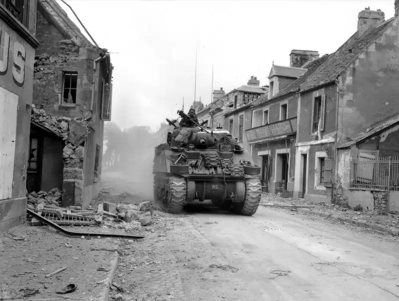 Canadian Sherman M4A4 Rolls into Caen, France — Operation Overlord, 1944