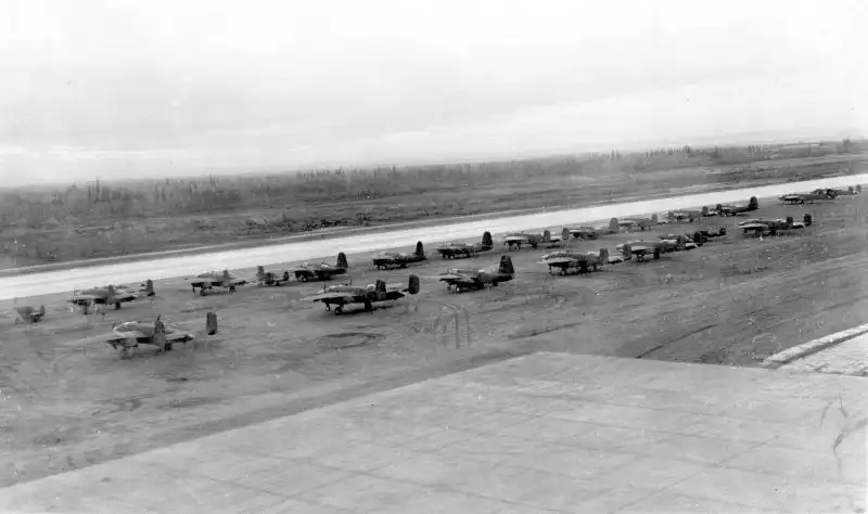 American B-25, A-20 Boston bombers and P-39 fighters lined up at Ladd Field, Alaska, prepared for Lend-Lease delivery to the Soviet Union, September 1942.