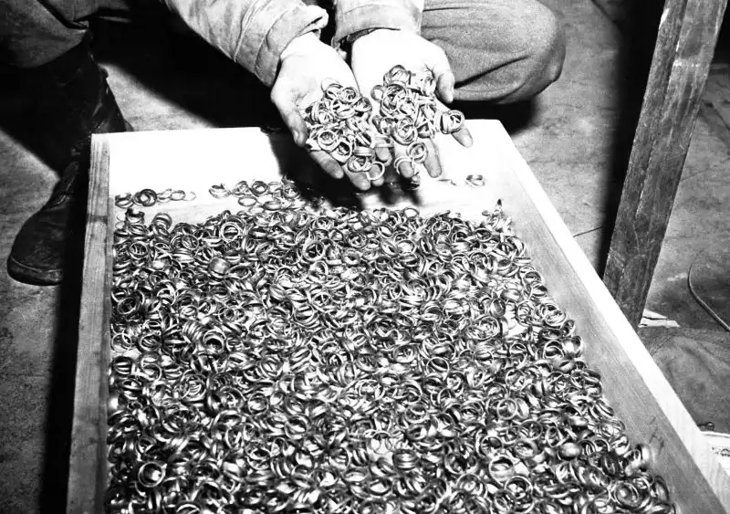 Wedding rings taken from victims and found by U.S. soldiers in Buchenwald, Germany, 5 May 1945