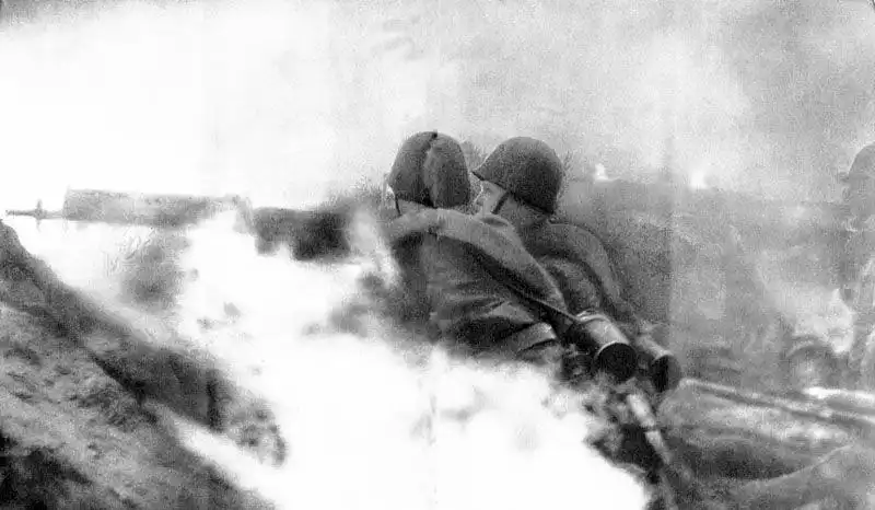 Polish MG 08 heavy machine gun crew defending Warsaw during the German invasion of Poland in September 1939.