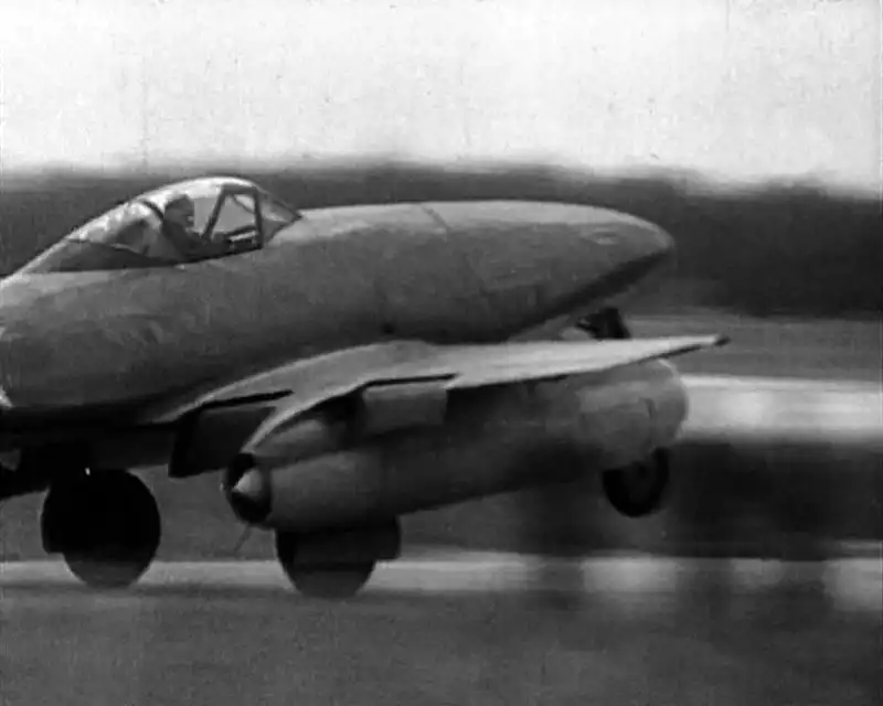 Captured German Messerschmitt Me 262 jet fighter taking off during flight evaluation by Soviet test pilot Andrei Kochetkov in late 1945.