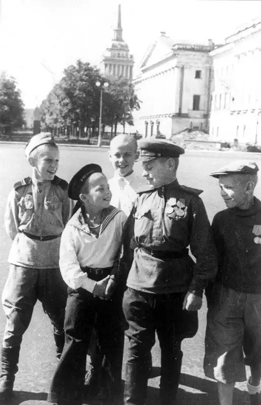 Young defenders of Leningrad and future Suvorov Military School cadets on Palace Square in 1944, several wearing military decorations earned during World War II.
