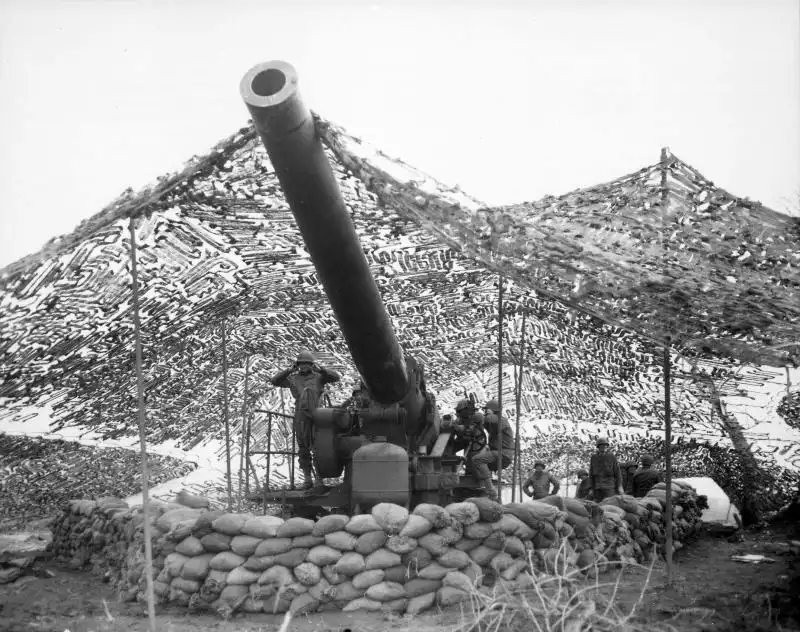 American 240 mm Howitzer M1 under camouflage netting near Mignano during the Italian Campaign in 1944.