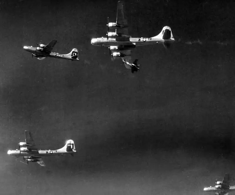 Japanese Ki-46 "Dinah" interceptor attacking an American B-29 Superfortress over the Pacific in 1945.
