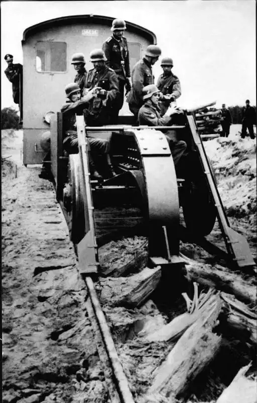 German Schienenwolf railway destroyer tearing up Soviet railroad tracks during the German retreat from occupied Soviet territory in 1943.