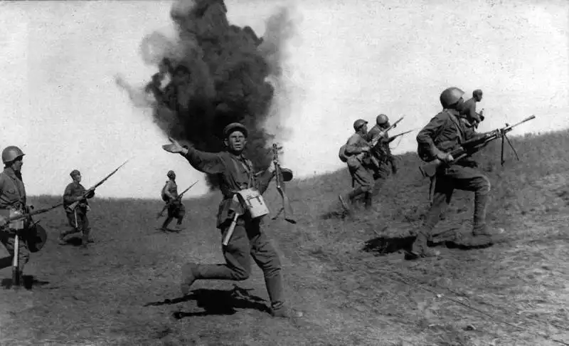Soviet infantry counterattack near Stalingrad, 1942. Shot by Arkady Shaikhet. Known as The Commissar