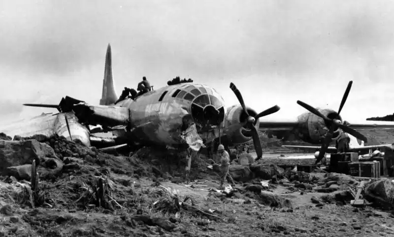 Damaged B-29 Superfortress Ramblin Roscoe after a crash landing on Iwo Jima following a bombing mission against Tokyo, April 1945.