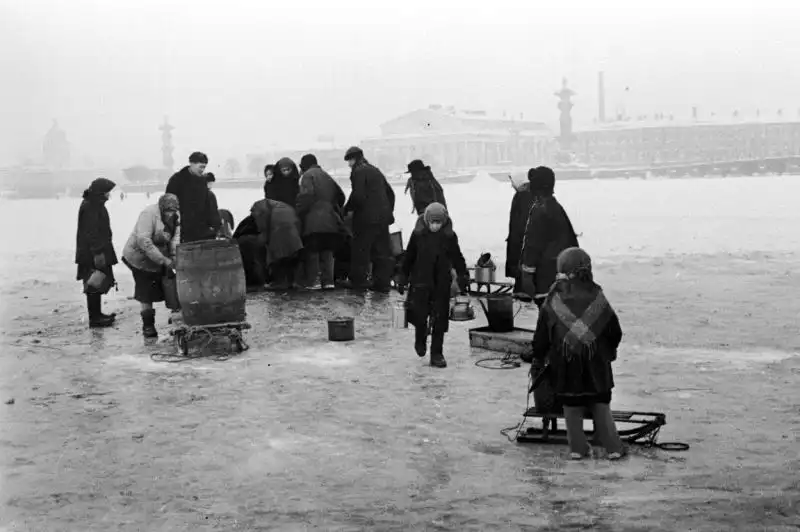 Residents of besieged Leningrad collect drinking water from the Neva River during the winter of 1941, amid electricity outages and disrupted water supply