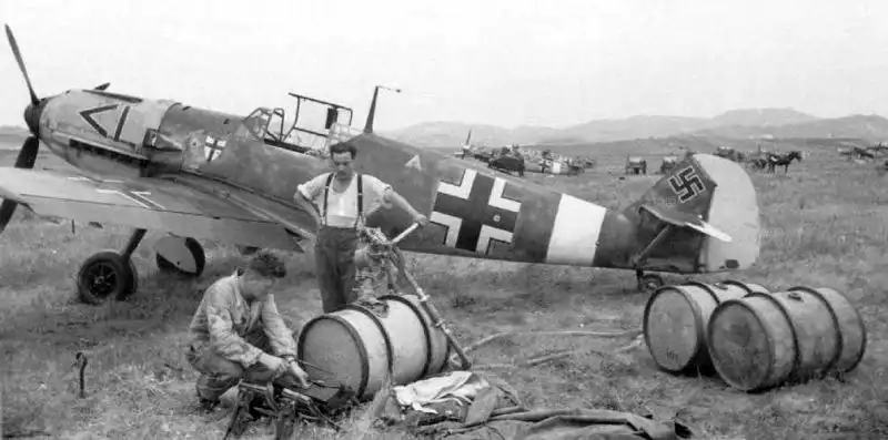 Messerschmitt Bf.109E7 fighter of JG-27 at a Yugoslav airfield during the German Balkan campaign in April 1941, showing Luftwaffe operations in Southeastern Europe.