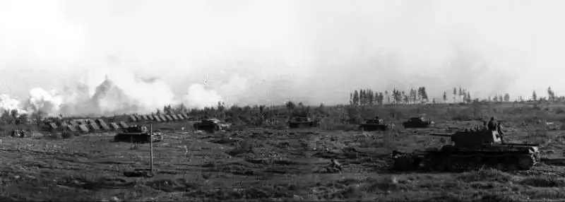 Panoramic view of Soviet KV-1 heavy tanks with PT-3 mine rollers and M-30 rocket frames before the battle in Karelia, 1944.