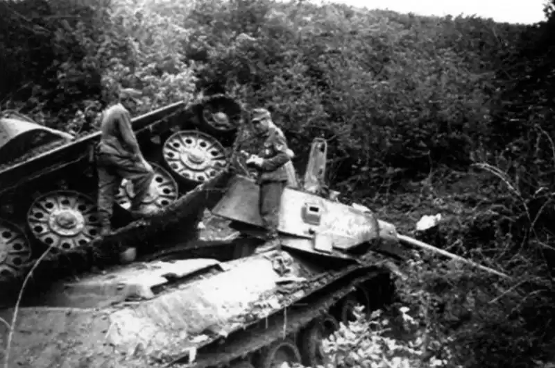 Wehrmacht Mountain Troops Inspect Knocked-Out T-34-76 Tanks, 1942