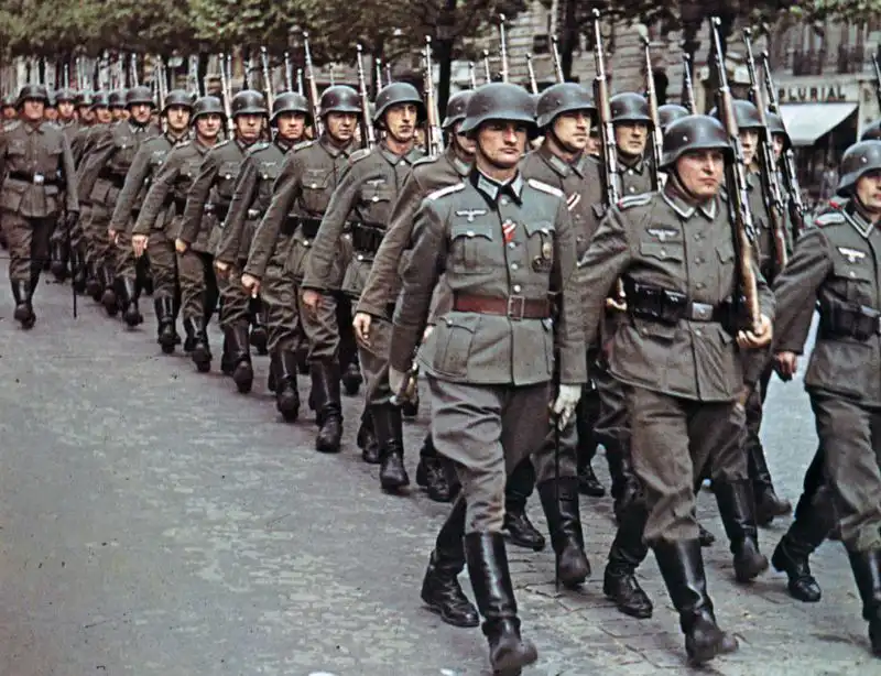 German troop column marching on the Champs-Élysées in occupied Paris, 1942 color photograph