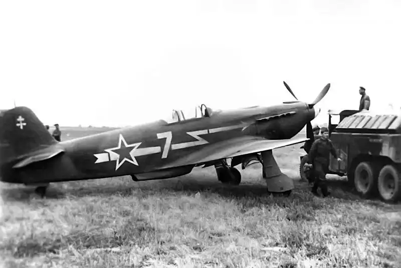 Soviet Yak-3 fighter from the Normandie-Niemen squadron, preparing for departure to France in June 1945, post-WWII historical moment.