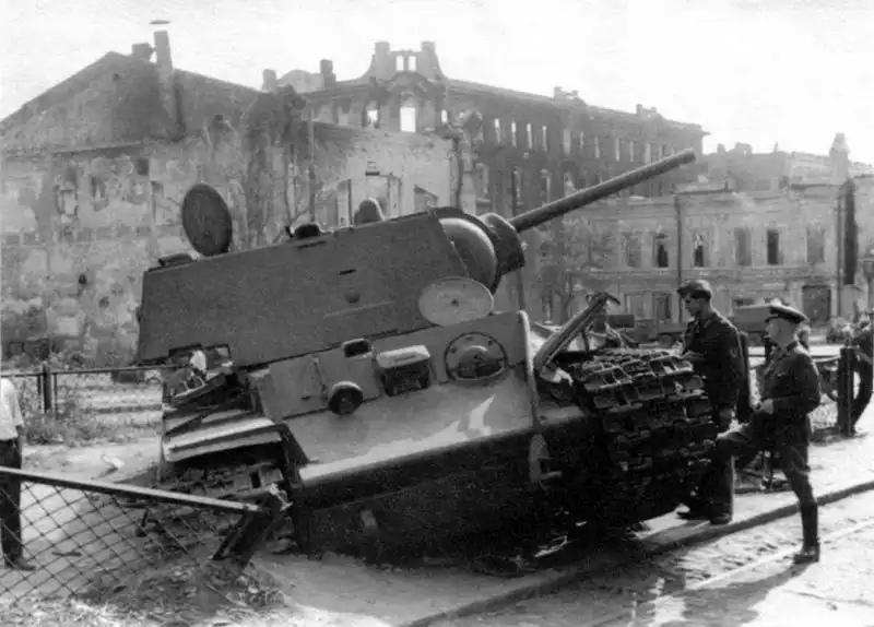 A Soviet KV-1 heavy tank stands destroyed on the market square of Rostov-on-Don after German forces seized the city in 1942