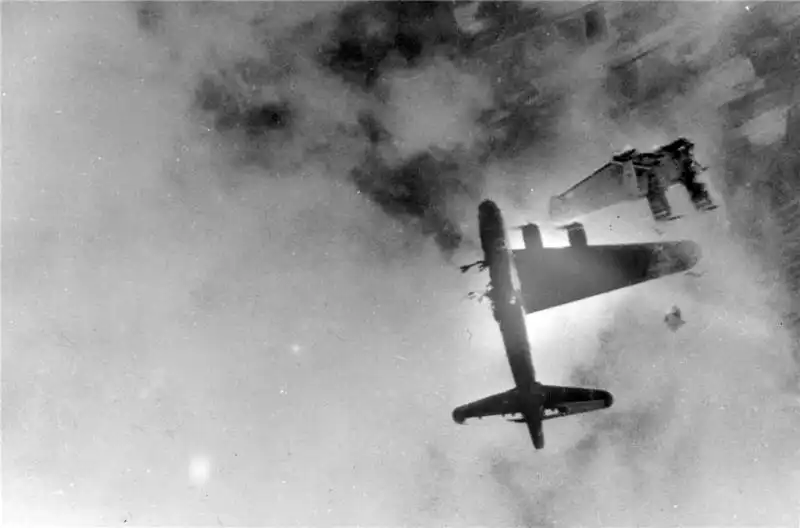 American B-17G Flying Fortress "Wee Willie" breaking apart after being hit by anti-aircraft fire over Germany in April 1945.
