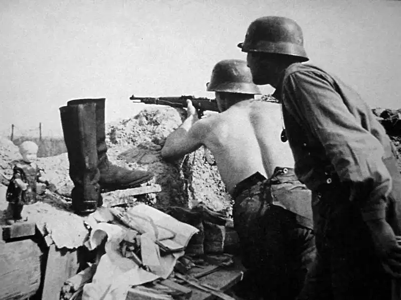 Two Waffen-SS Leibstandarte soldiers in a trench during anti-partisan operations in Northern Italy, 1943