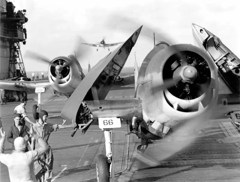 F6F-3 Hellcat fighters landing on USS Enterprise after strike on Truk, February 1944