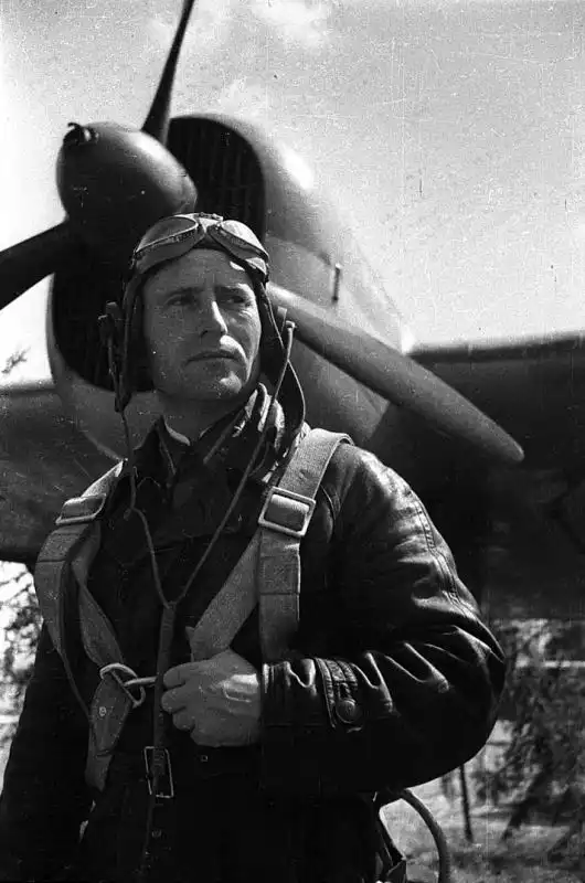 Soviet pilot Major Ivan Semyonovich Polbin posing with his SB bomber, USSR, 17 August 1941