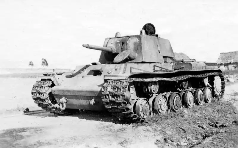 A Soviet KV-1 tank with a rare L-11 76.2mm gun destroyed in 1941, showing a shell stuck in the barrel, symbolizing early Soviet tank modifications.