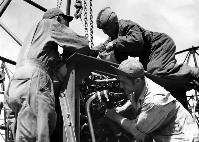 US and Soviet Technicians Service B-17 Flying Fortress Engine at Poltava Airfield, June 1944
