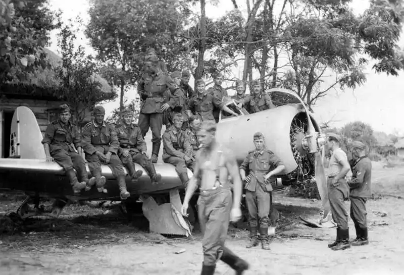 WWII photo of a damaged Soviet R-10 reconnaissance aircraft captured by German forces on a Ukrainian airfield during Operation Barbarossa, summer 1941.