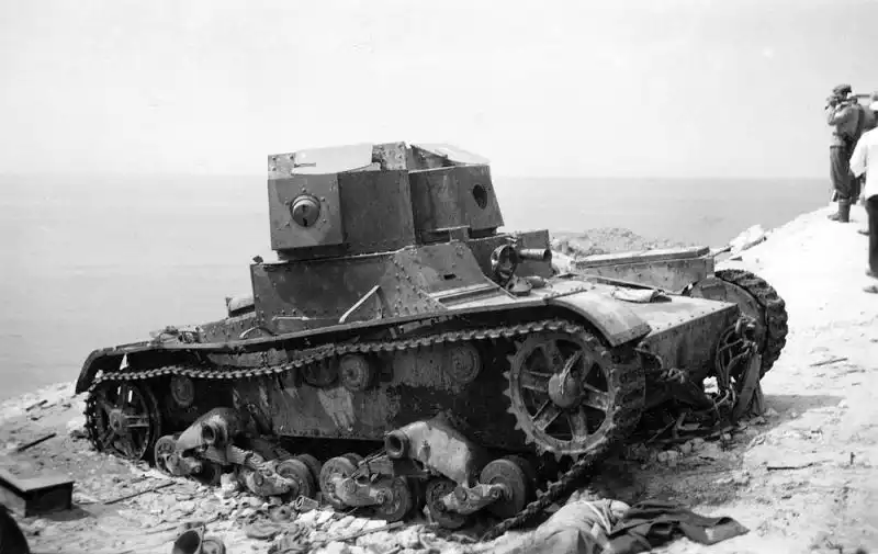 Knocked-out Soviet twin-turret T-26 light tank on the coastal cliff edge of Kazachya Bay near Sevastopol in summer 1942.