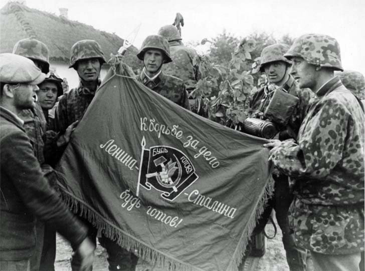 The heroic soldiers of the Waffen SS and flag of the Soviet Pioneers