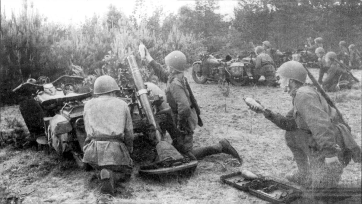 The Soviet 82-mm mortar platoon is firing at the enemy in Baranovichi