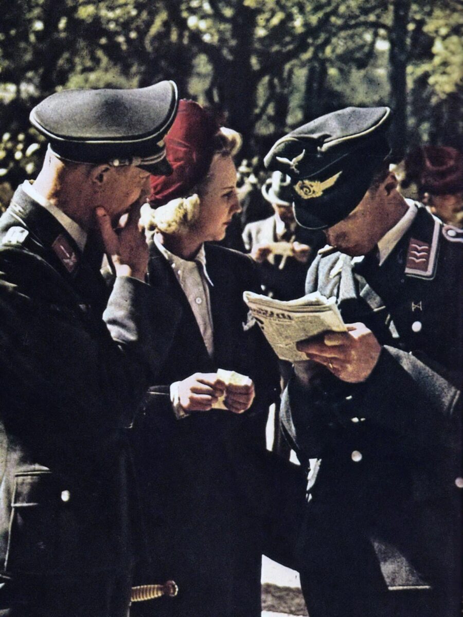 Luftwaffe servicemen, young Frenchwoman
