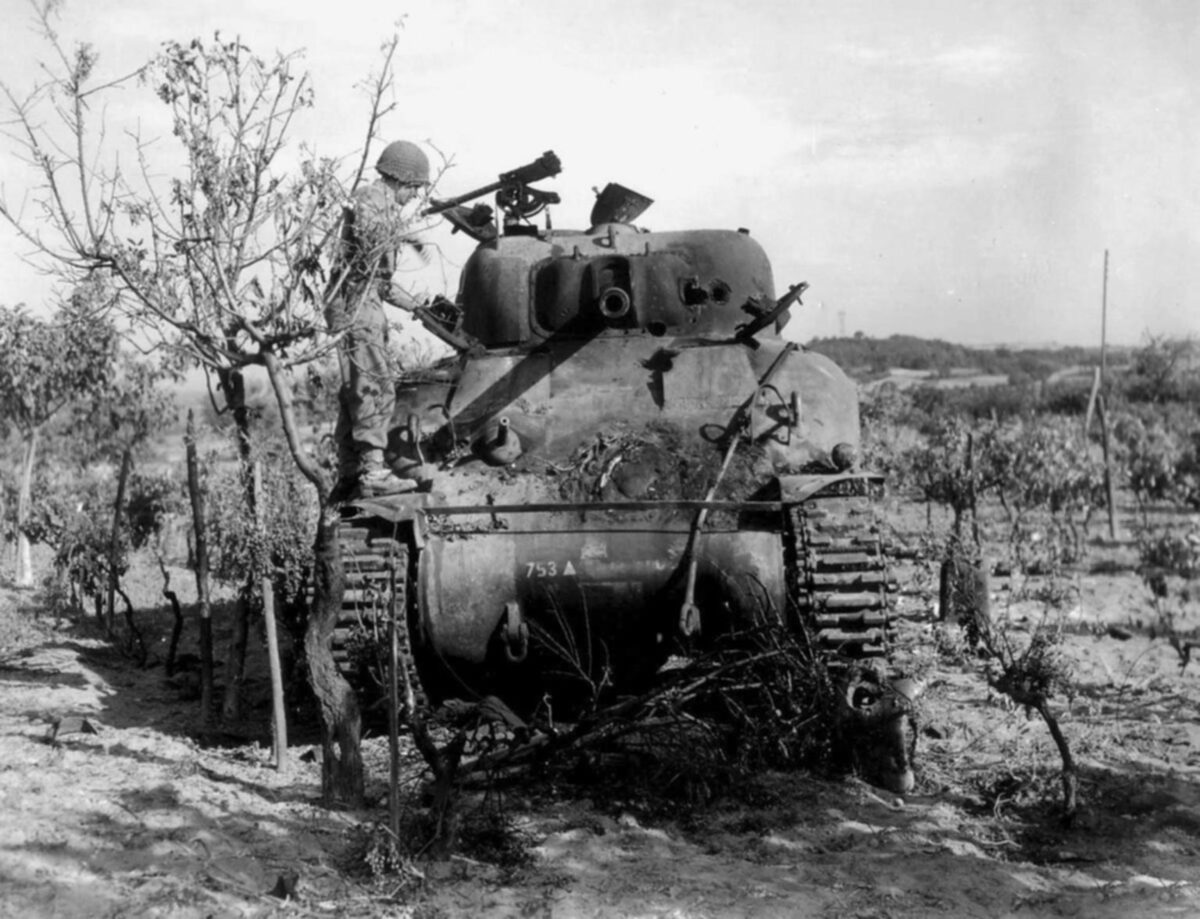 An American soldier, Sherman tank