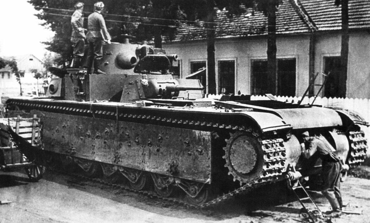 German soldiers inspect the T-35 tank