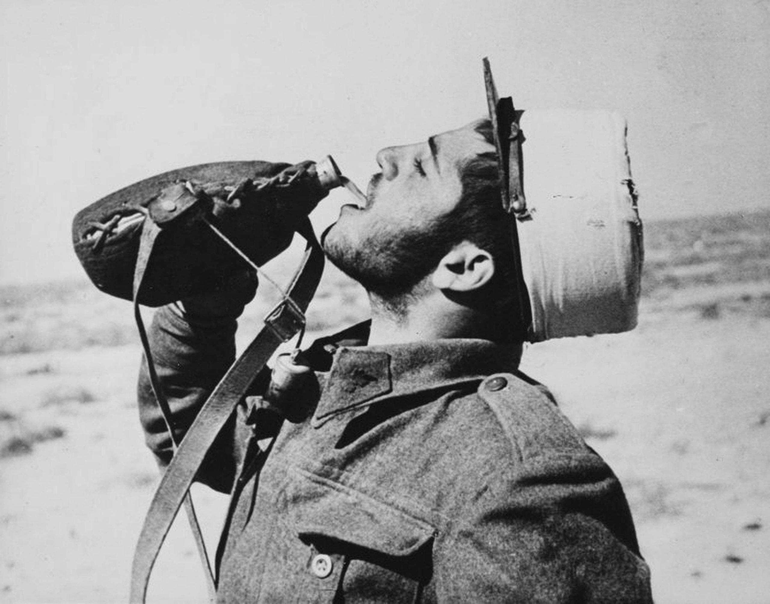 Free French Forces soldier drinks