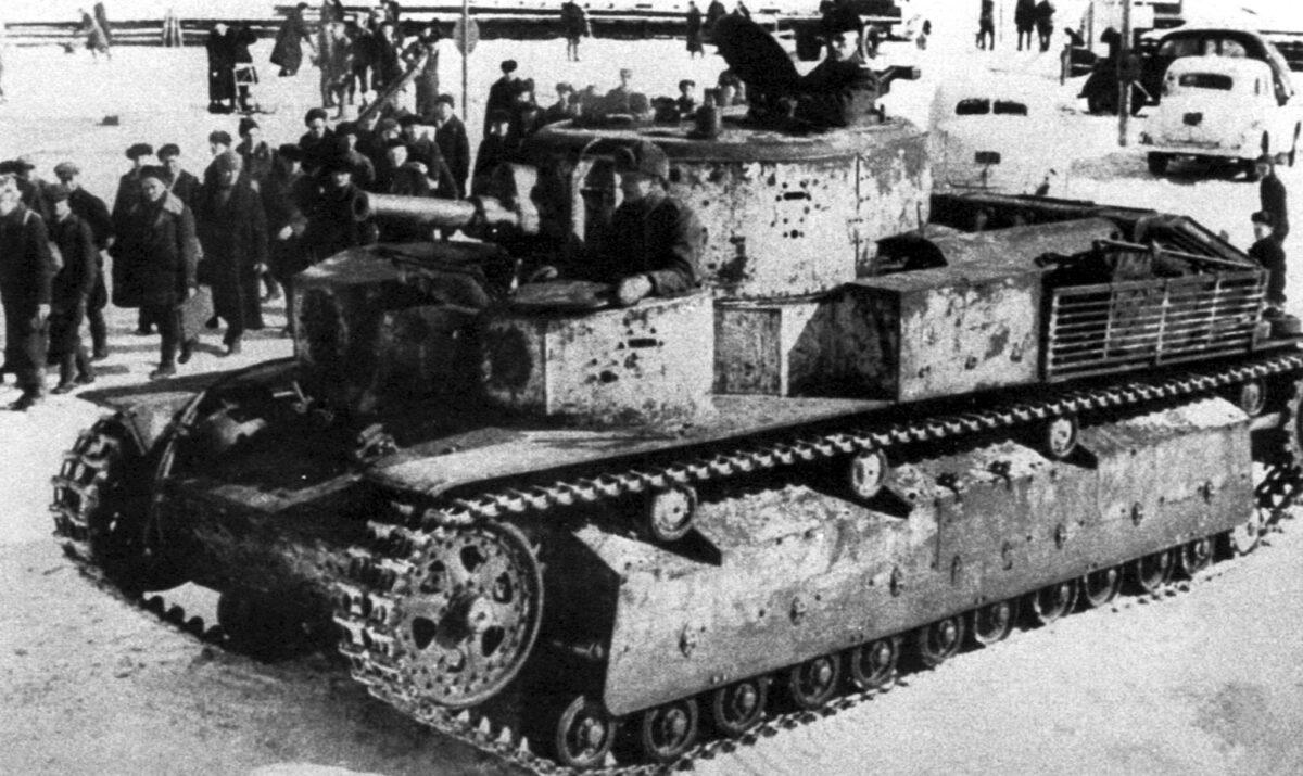 Finnish tank crew evacuate captured Soviet T-28 tank